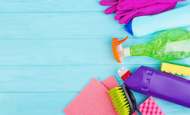 Cleaning service concept. Colorful cleaning set for different surfaces